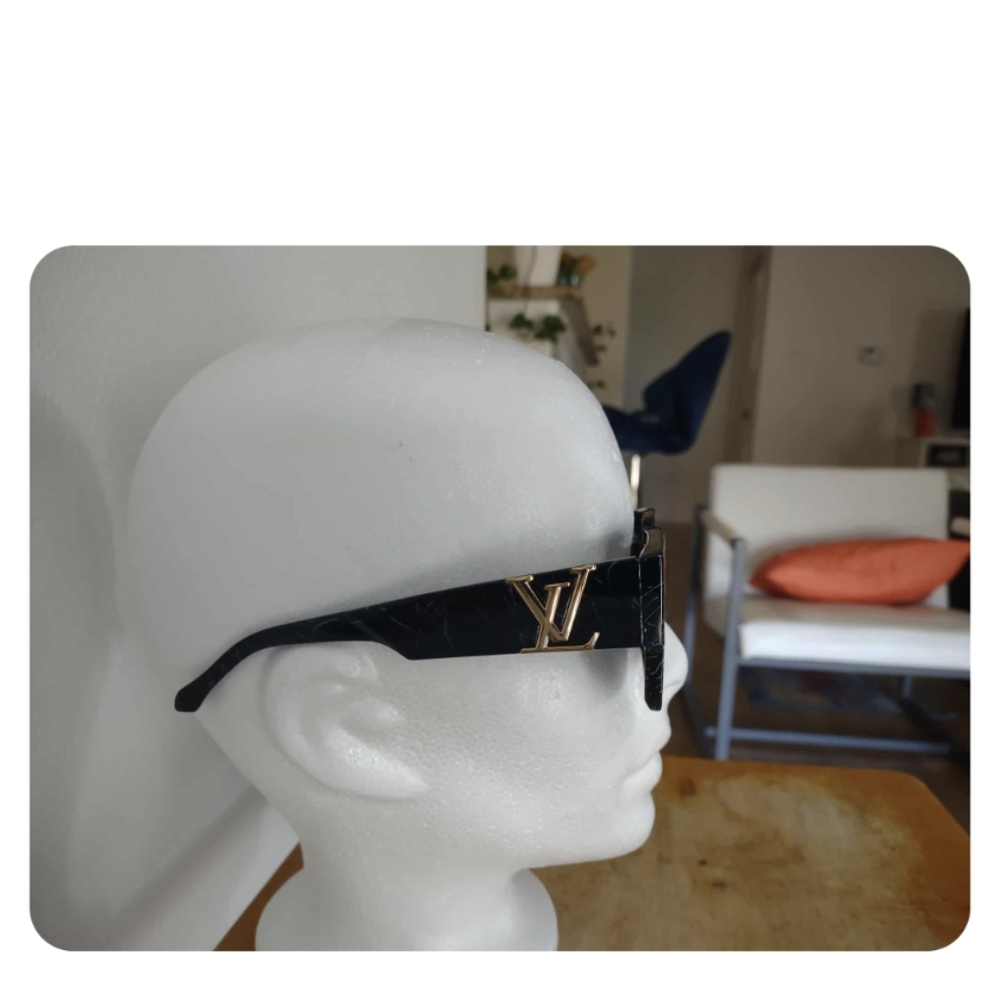 Louis Vuitton Black Frame Sunglasses with Gold Logo